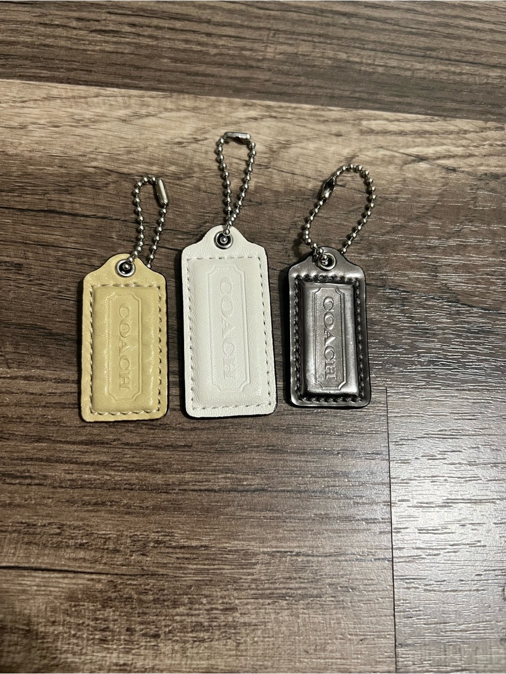 3pc Coach lot Leather hangtag, keychain, bag charms in Yellow, White, & Gray